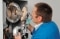 The picture shows an installer performing maintenance.
